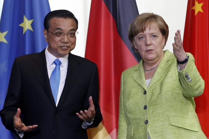 Ministro de China y cancillera de Alemania