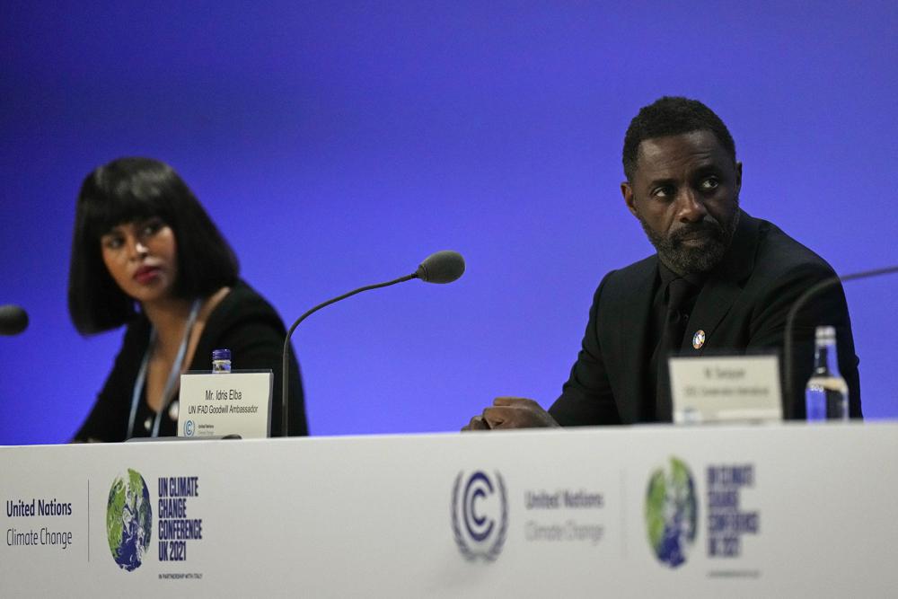 Idris Elba y su esposa presentes en la COP26. - Foto Alastair Grant/AP
